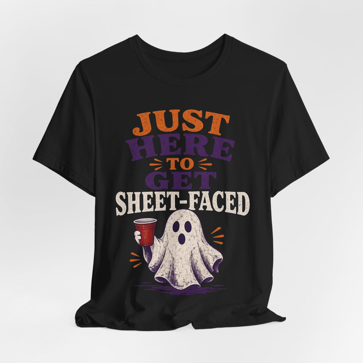 Black crew-neck t-shirt with centered "Just Here to Get Sheet-Faced" ghost graphic