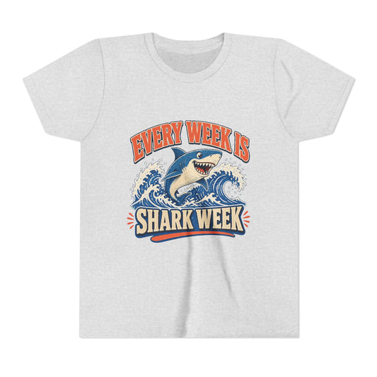 Kids graphic T-shirt, athletic heather, front with blue shark “Shark Week” design