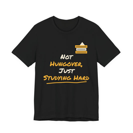 Black graphic T-shirt with “Not hungover, just studying hard” and books icon.