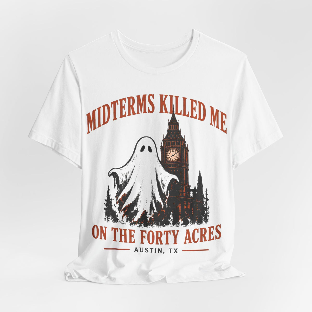 White graphic crewneck T-shirt featuring ghost, clock tower, and 'On the Forty Acres' art