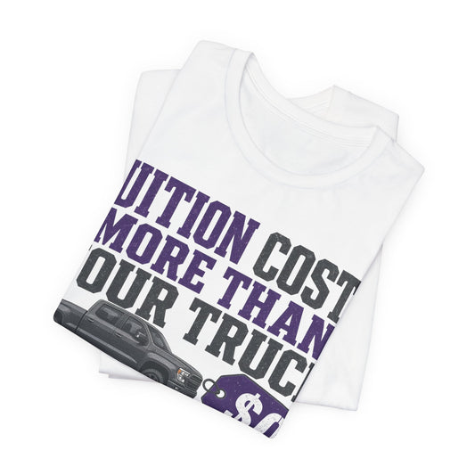 White crew-neck T-shirt (folded) showing 'Tuition Costs More Than Your Truck' and $0