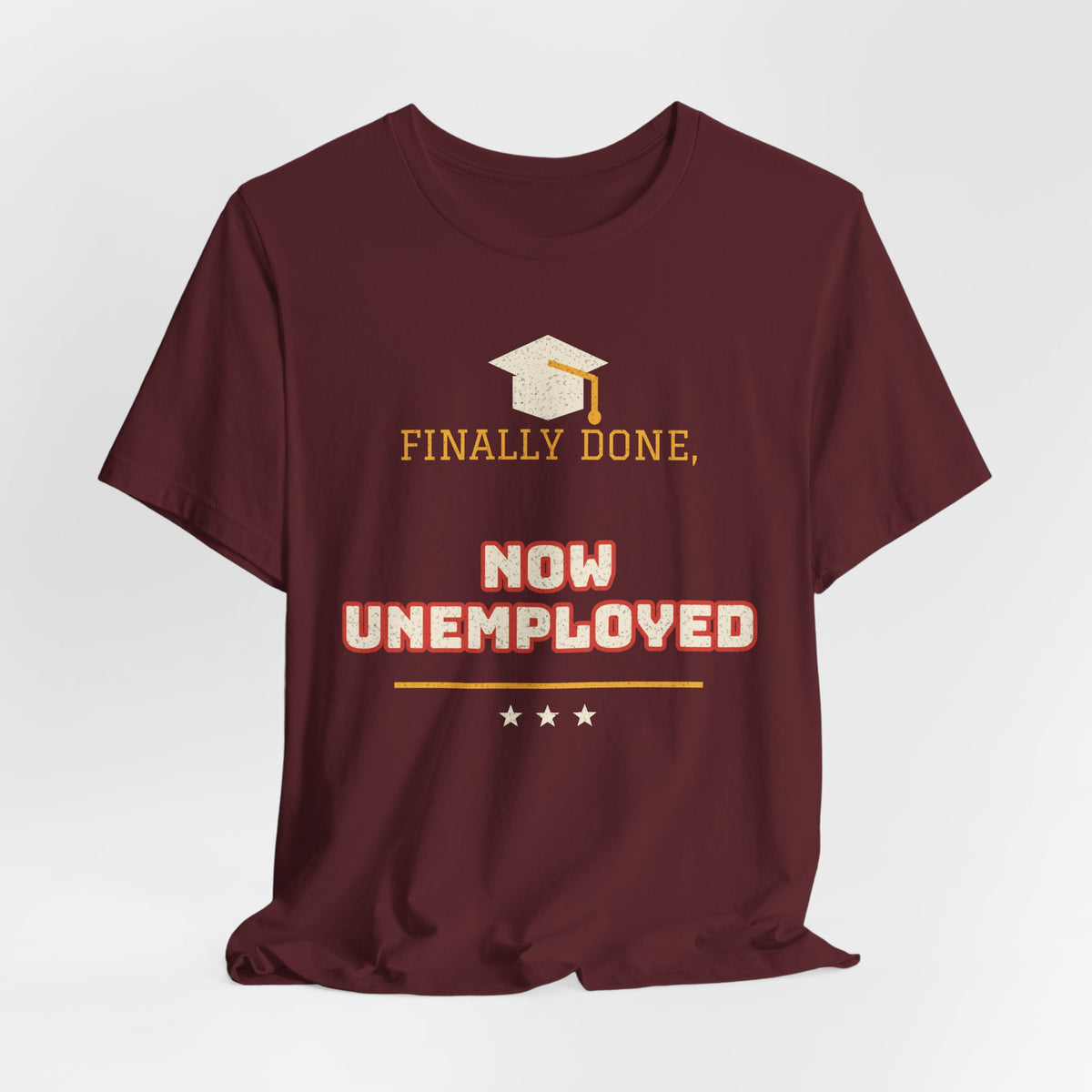 Maroon crew-neck T-shirt with graduation cap and FINALLY DONE NOW UNEMPLOYED graphic