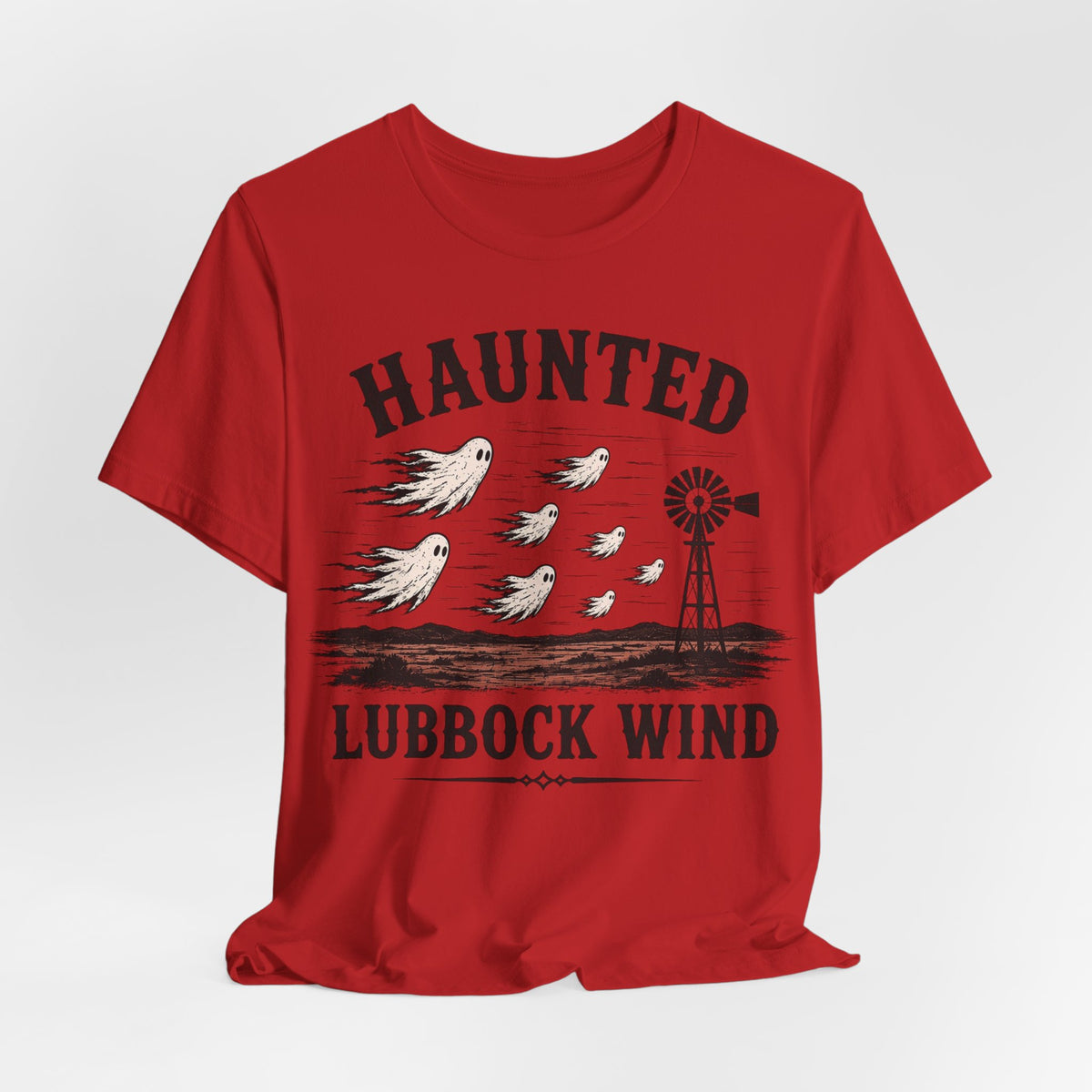 Red crew-neck tee with Haunted Lubbock Wind graphic, birds over windmill silhouette