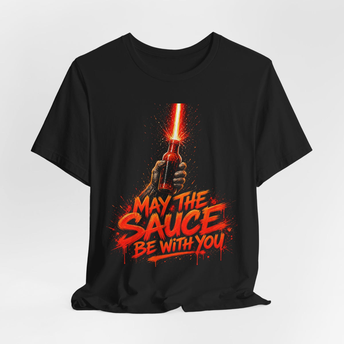 Black crewneck tee with chest graphic: fiery lightsaber hand and 'May the Sauce Be With You'