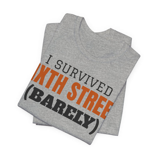 Heather gray T-shirt with orange and black stacked 'I Survived ... (Barely)' print