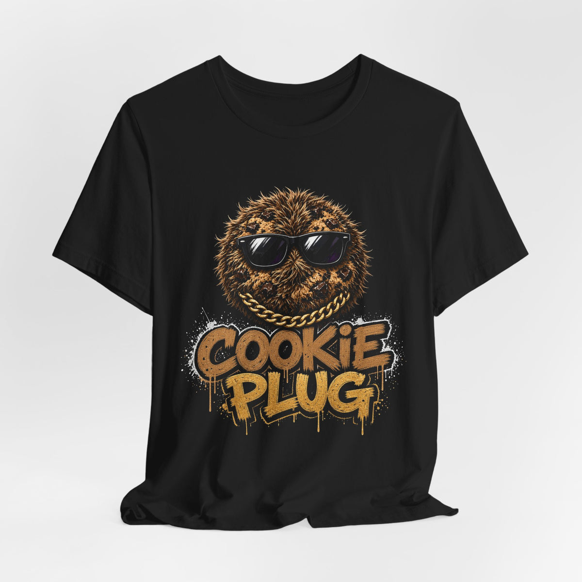 Black crewneck T-shirt with front graphic text 'COOKIE PLUG' and sunglasses cookie face