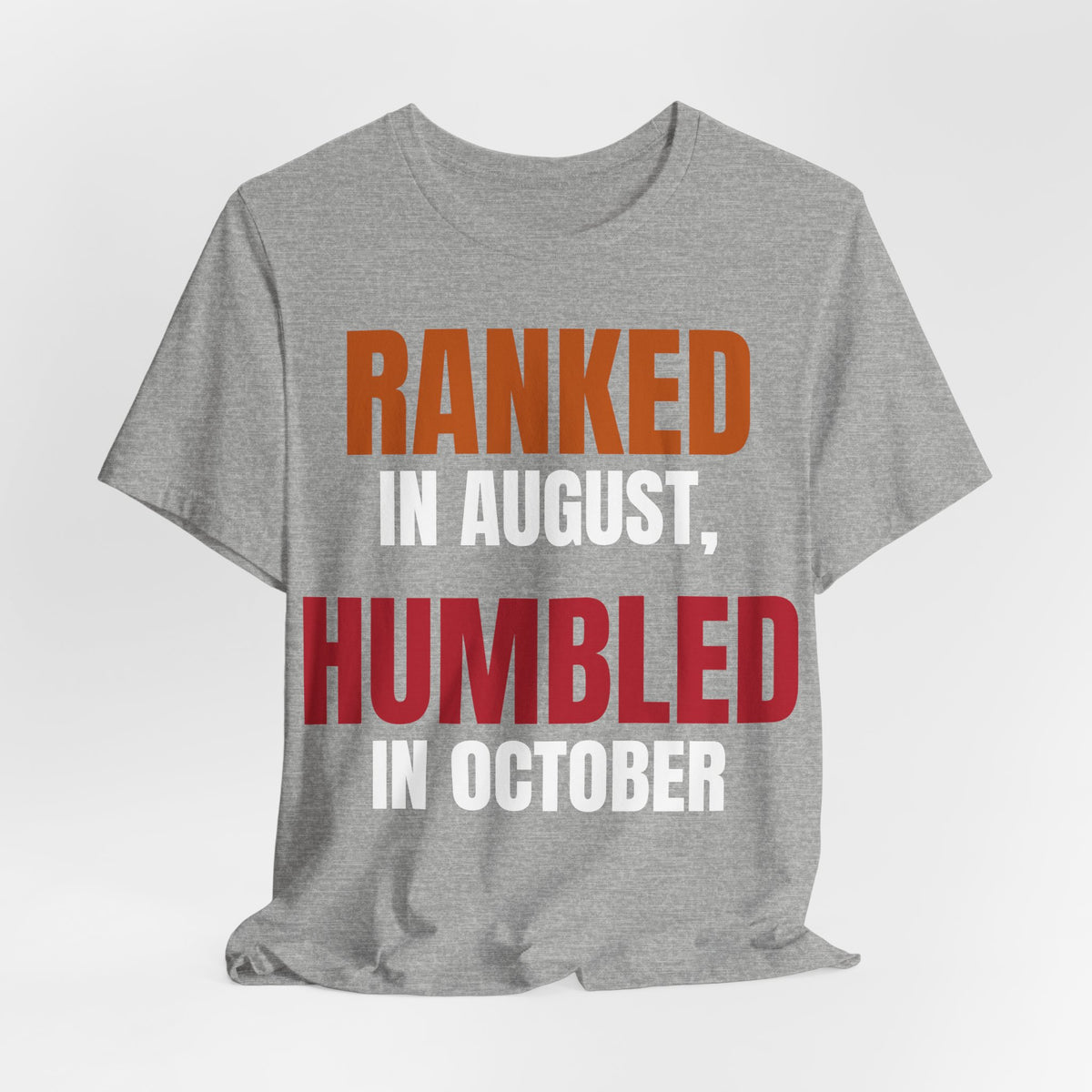 Athletic heather crewneck tee with centered “Ranked…Humbled…” typography
