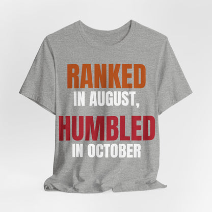 Athletic heather crewneck tee with centered “Ranked…Humbled…” typography