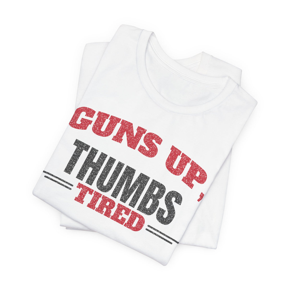 White T-shirt stack showing Guns Up Thumbs Tired red and black graphic