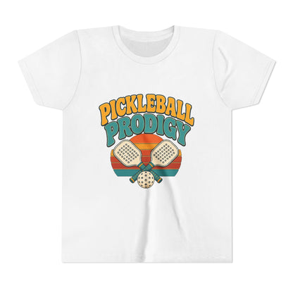 Kids white pickleball tee with colorful "Pickleball Prodigy" graphic and paddles