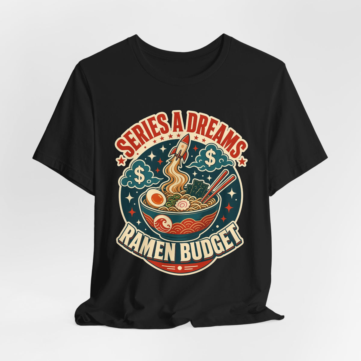 Black crewneck graphic tee with centered "SERIES A DREAMS" "RAMEN BUDGET" ramen bowl print