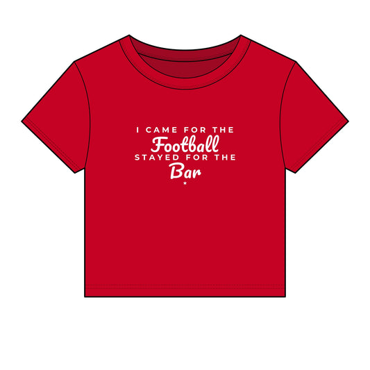 Red crop top with football-to-bar slogan graphic, short sleeves
