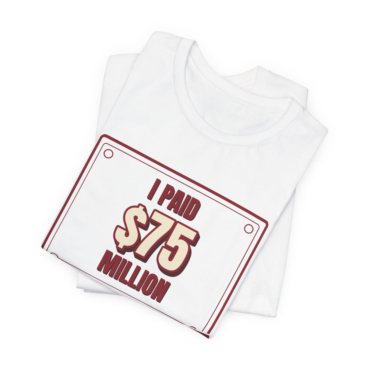 White crewneck graphic tee, folded, showing “I Paid $75 Million” text