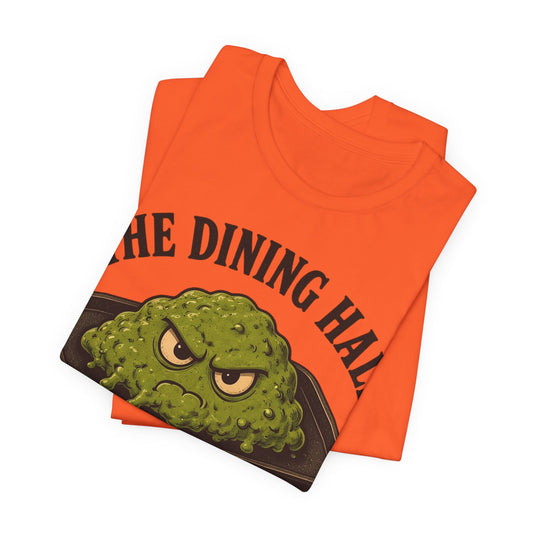 Orange crewneck tee angled, 'The Dining Hall' plus green food mascot graphic