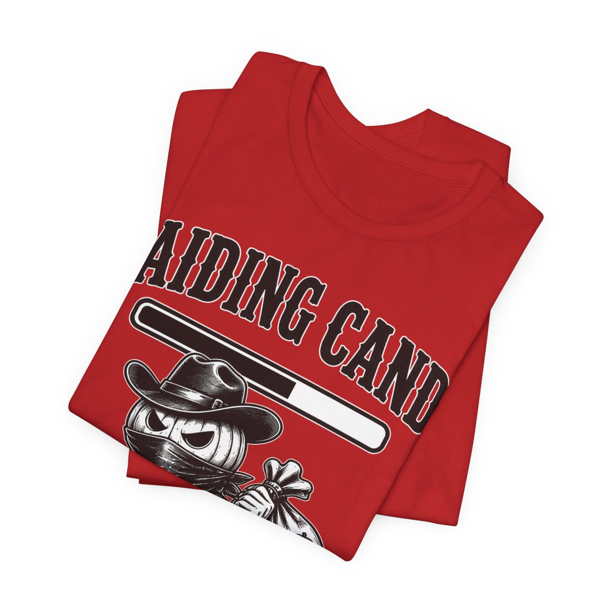 Red folded T-shirt showing cowboy candy monster graphic and 'Raiding Candy' text