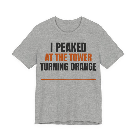 Heather gray T-shirt with orange and black 'I PEAKED AT THE TOWER TURNING ORANGE' text.