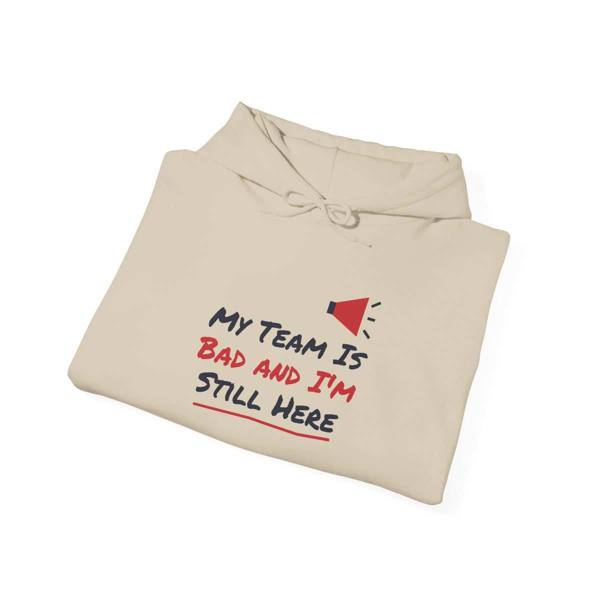 Light tan hoodie with front graphic text: “My Team Is Bad and I’m Still Here”