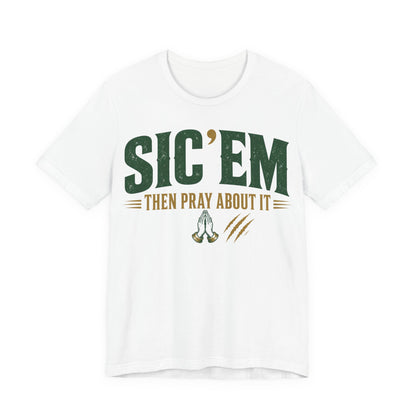 White crewneck tee with green 'SIC 'EM' and 'THEN PRAY ABOUT IT' print