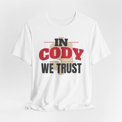 White graphic T-shirt with 'IN CODY' and 'WE TRUST' chest print