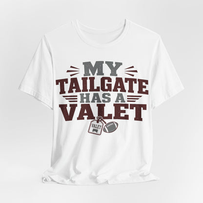 White graphic T-shirt with large 'MY TAILGATE HAS A VALET' text and small valet patch