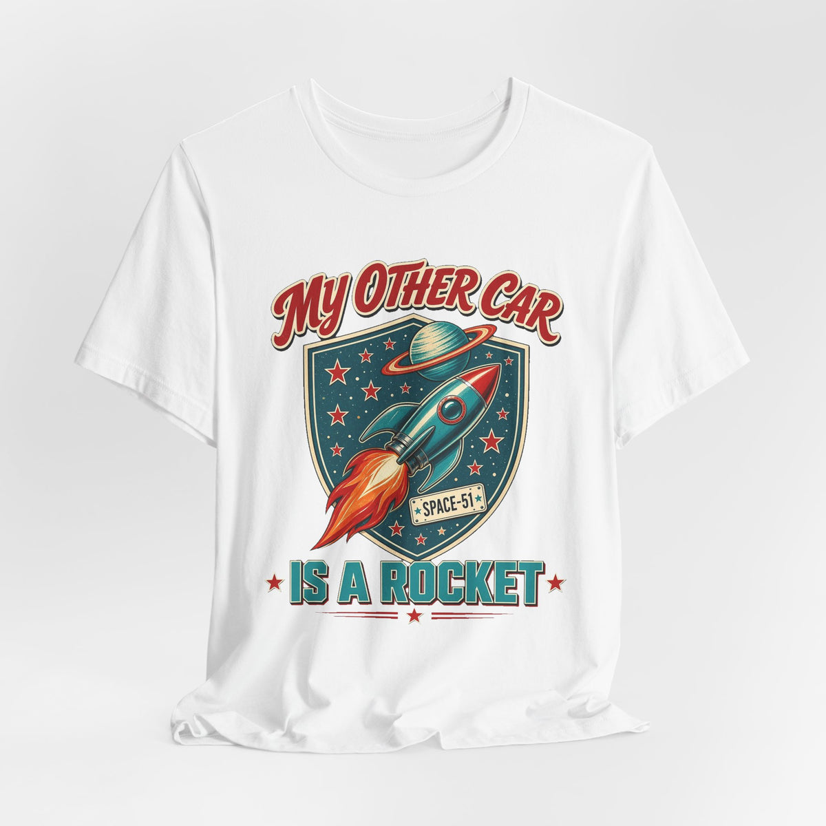 White crewneck t-shirt front with colorful rocket and stars graphic