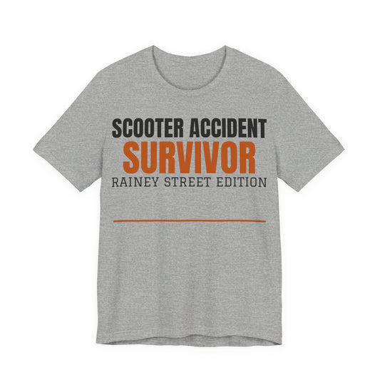 Heather gray graphic T-shirt with Scooter Accident Survivor Rainy Street Edition print