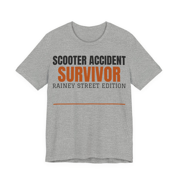 Heather gray graphic T-shirt with Scooter Accident Survivor Rainy Street Edition print