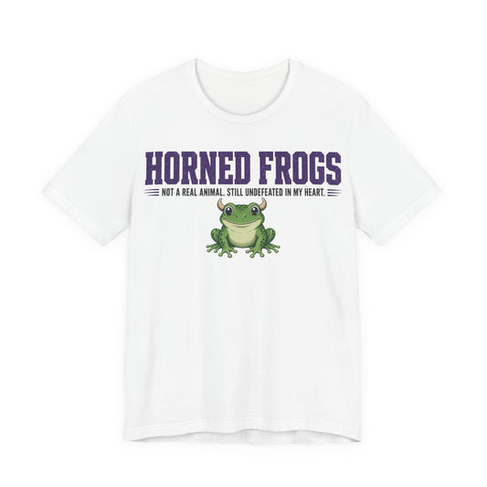 White graphic t-shirt with purple 'Horned Frogs' text and green frog illustration