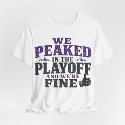 White crew-neck T-shirt with 'WE PEAKED IN THE PLAYOFF AND WE' print and thumbs-up