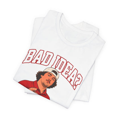 Folded white graphic T-shirt showing 'BAD IDEA?' headline and illustrated man's face