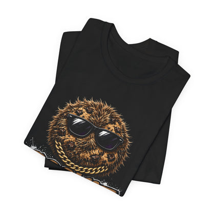Black crewneck T-shirt laid flat, front graphic of cookie face with sunglasses and gold chain
