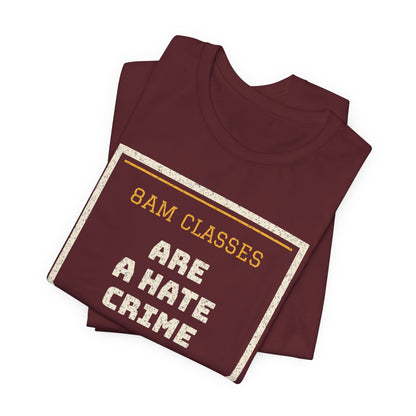 Maroon graphic T-shirt with "8am Classes Are a Hate Crime" front print