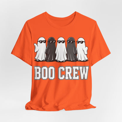 Orange crew neck T-shirt with gnome lineup graphic and BOO CREW lettering