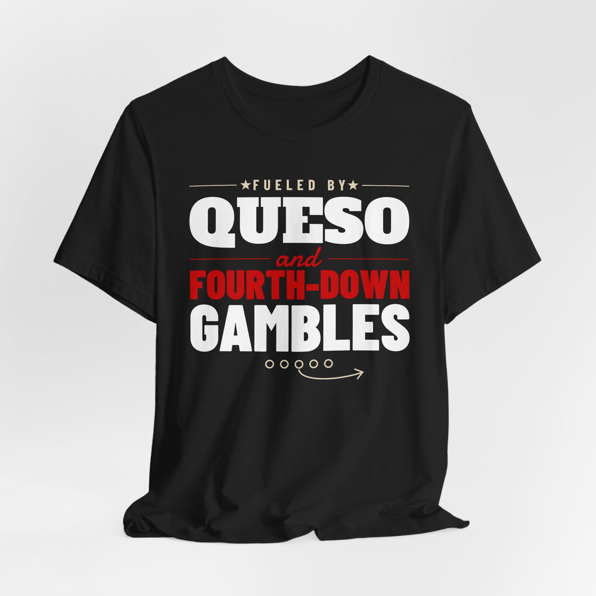 Black graphic T-shirt with “Fueled by Queso” and “Fourth-Down Gambles” football print