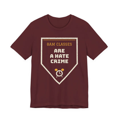 Maroon graphic T-shirt with '8AM CLASSES' hate crime emblem