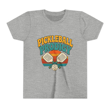 Kids ash gray pickleball tee with colorful "Pickleball Prodigy" graphic and paddles
