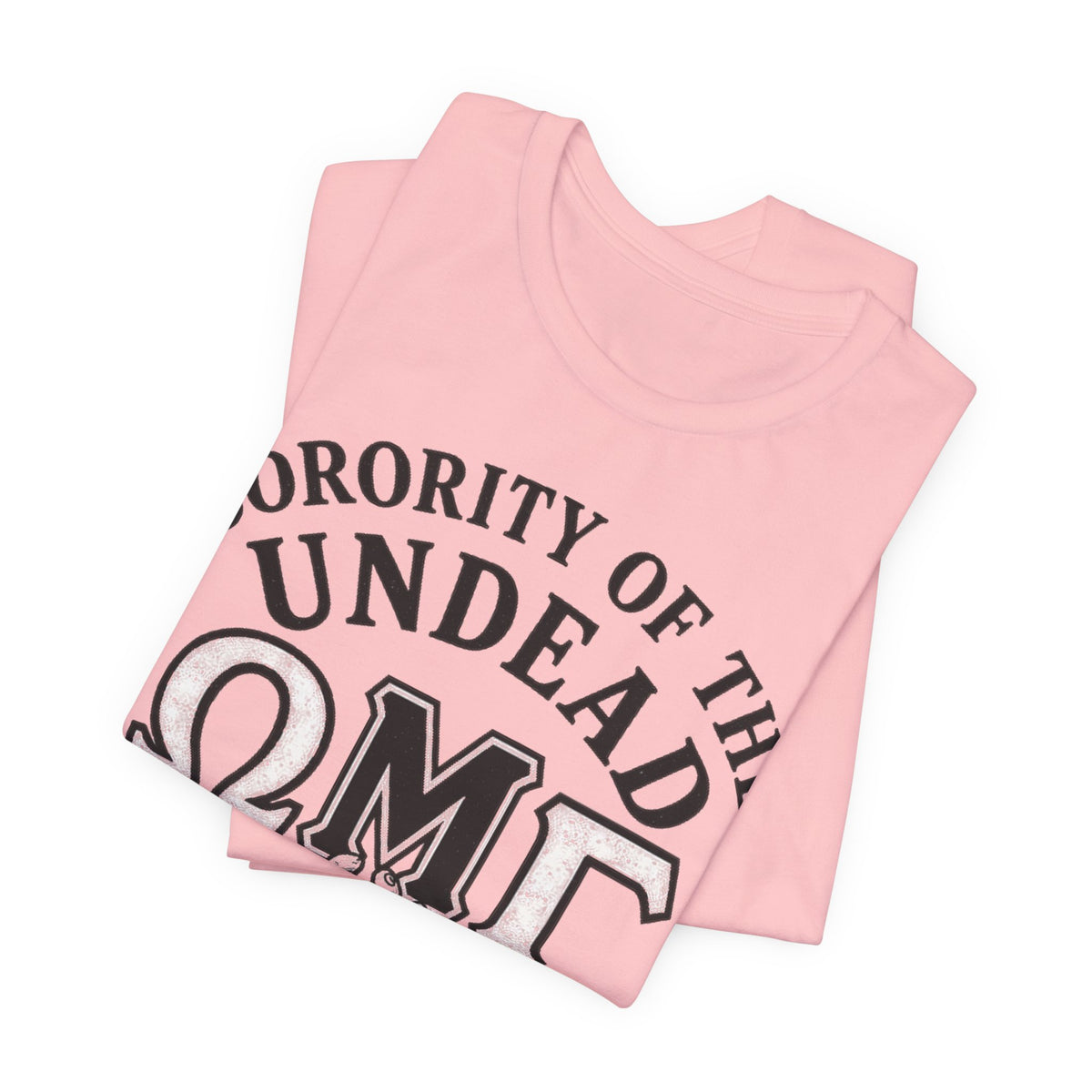 Pink tee folded with large EMT logo and text across chest