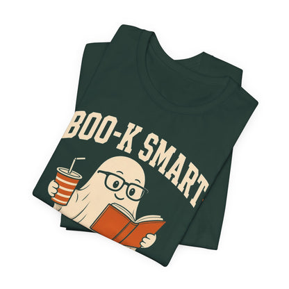 Dark green graphic T-shirt, angled view of BOO-K SMART text and cartoon