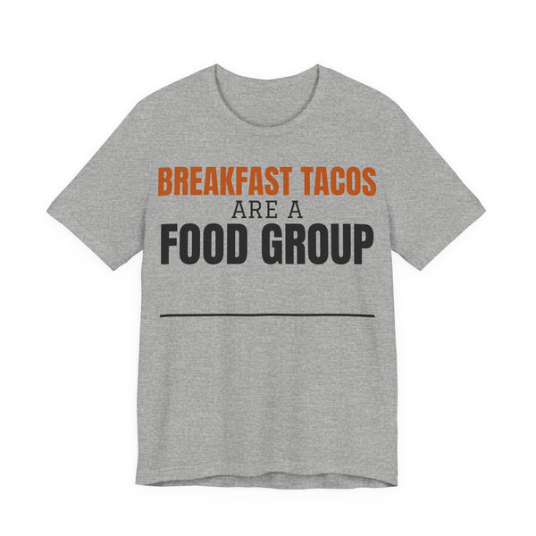 Heather gray crew-neck tee with orange/black 'Breakfast Tacos are a Food Group' graphic