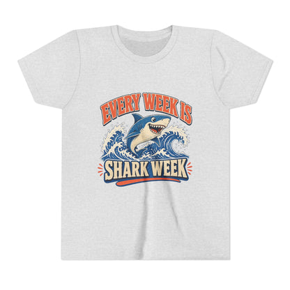 Kids graphic T-shirt, athletic heather, front with blue shark “Shark Week” design