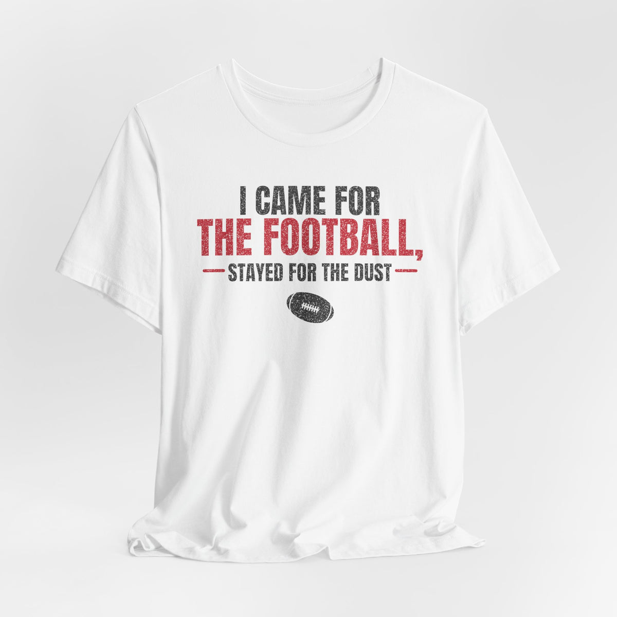 White crewneck football graphic t-shirt with red “stayed for the dust” lettering