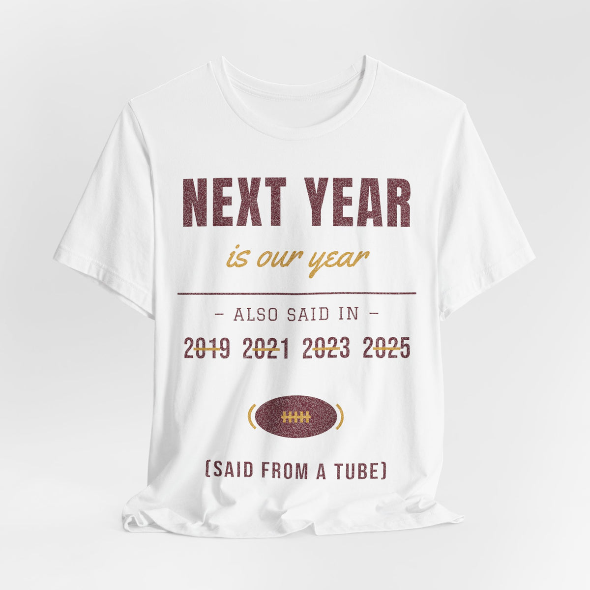 White graphic T-shirt with 'NEXT YEAR is our year' message and football emblem