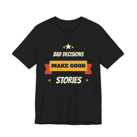 Black short-sleeve T-shirt with colorful slogan graphic: BAD DECISIONS, MAKE GOOD STORIES