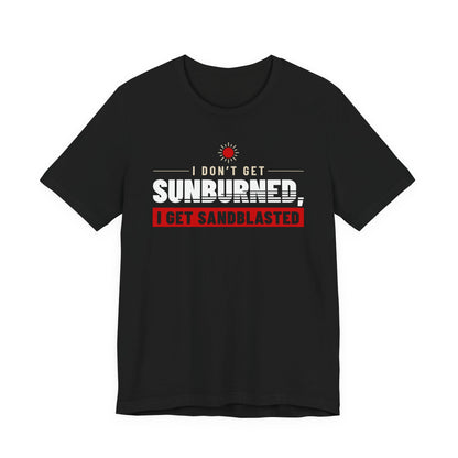 Black crew-neck T-shirt with bold 'SUNBURNED' and 'SANDBLASTED' graphic text