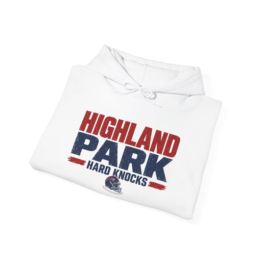 Folded white pullover hoodie showing front graphic and drawstring hood