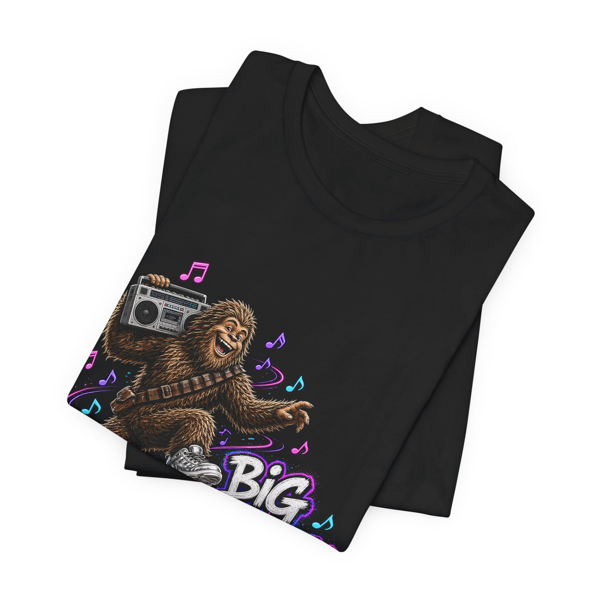 Black graphic T-shirt folded with Big Footwork dancing Bigfoot and boombox
