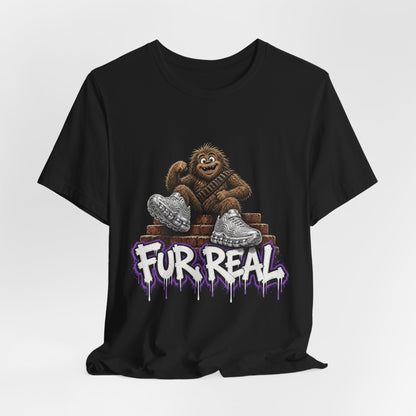 Black crewneck t-shirt with cartoon ape and dripping purple text graphic