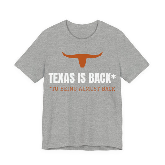 Athletic heather Texas Is Back* tee with orange longhorn and text graphic