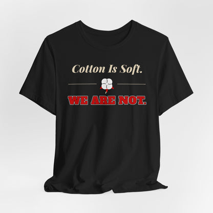 Black cotton T-shirt with centered gold-and-red chest text and fist icon graphic