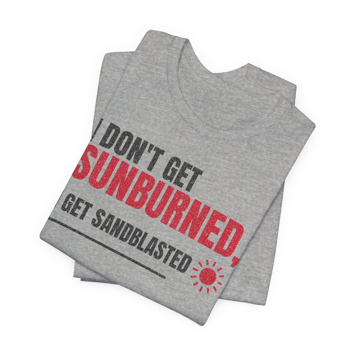 Gray crew-neck T-shirt stack with red 'SUNBURNED' and 'SANDBLASTED' text graphic